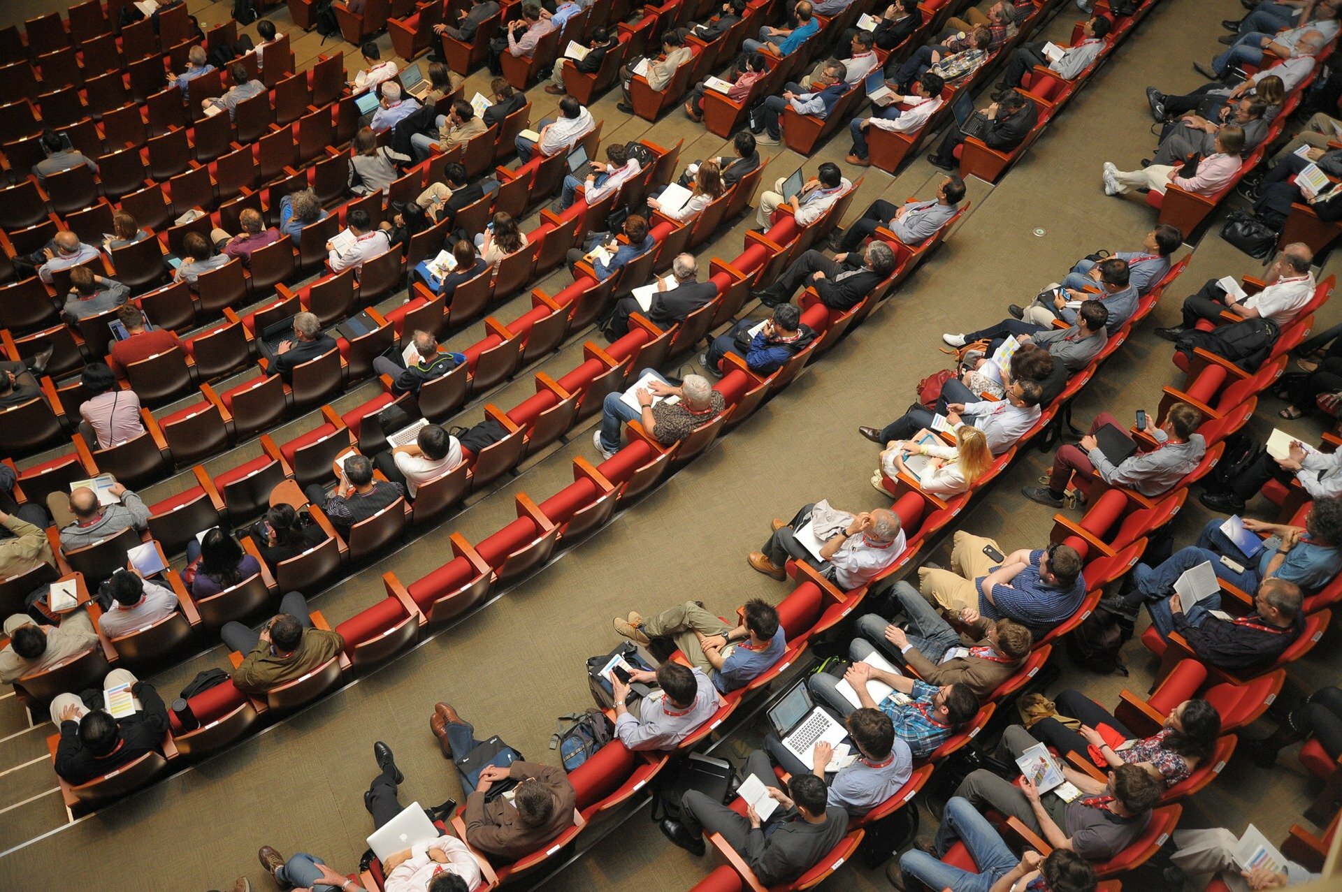 People seated in a lecture theatre